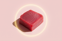 Minimalist premium product photo of a fresh raw tuna fillet, isolated on a soft pastel pink background, diffused natural lighting, clean and elegant composition, high-quality macro food photography, luxury wellness aesthetic, no text or packaging, centered ingredient with soft shadows. with a gentle sunlight glow symbolizing natural vitamin D

