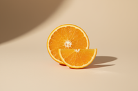 Minimalist premium product photo of a sliced orange with fresh texture, isolated on a soft pastel beige background, diffused natural lighting, clean and elegant composition, macro food photography style, wellness supplement aesthetic, no text or packaging, centered ingredient with soft natural shadows.
